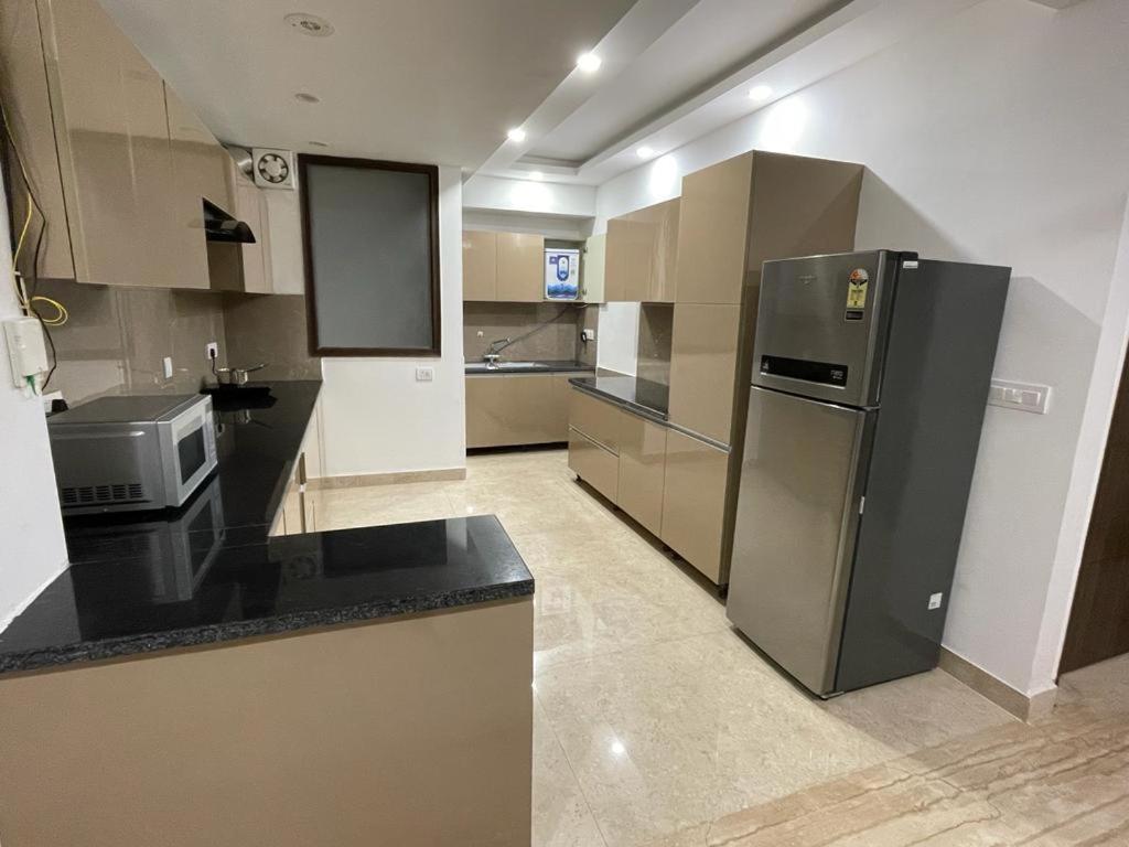 Flxho Uno - Serviced Apartment & Rooms - Golf Course Road Гургаон Екстериор снимка